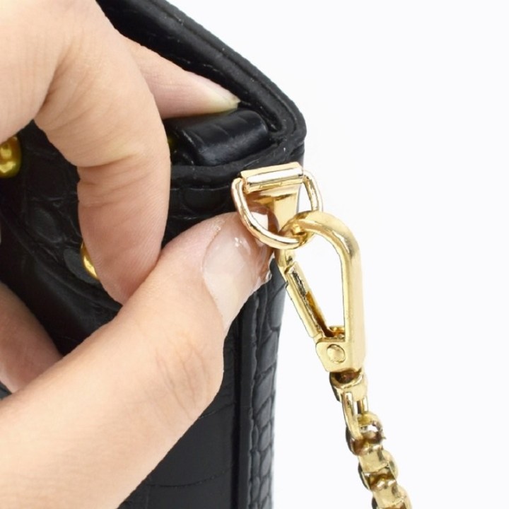 Attache sangles sac cuir