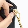 Attache sangles sac cuir
