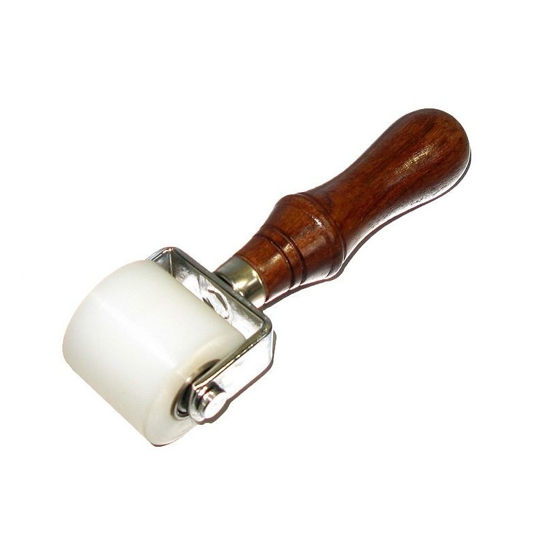 Rouleau presseur cuir